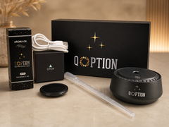 DOPTION product set including diffuser, oil, and packaging on a beige surface.
