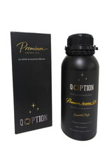QOption Essence Emerald Drift fragrance oil bottle with retail box