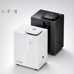 QOption Essence QA1000 Pro commercial HVAC scent diffusers in black and white metal finishes with digital controls.