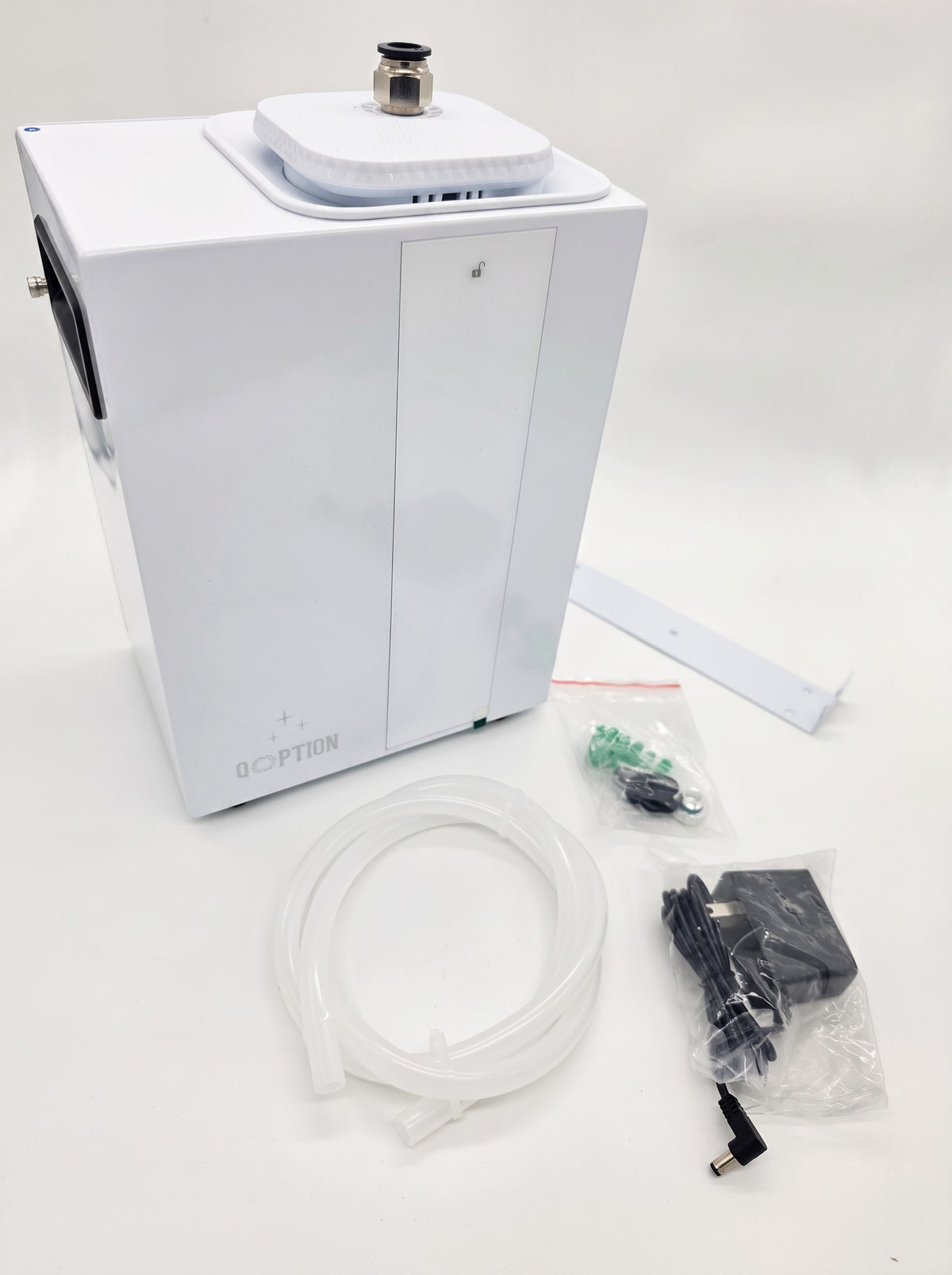 QOption Essence QA1000 white commercial HVAC scent diffuser with power adapter, tubing, and mounting hardware