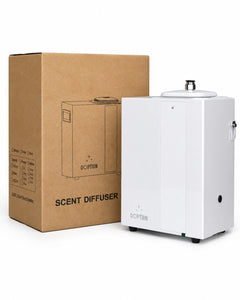 QOption Essence QA1000 commercial HVAC scent diffuser in white metal with its cardboard product packaging box