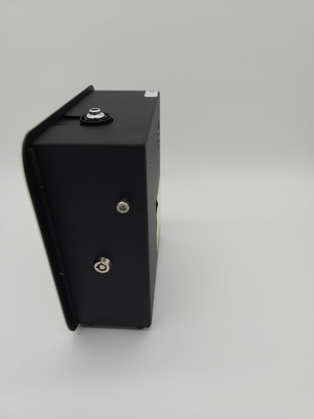 QOption Essence QX300 black HVAC scent diffuser machine side view showing metal connection ports